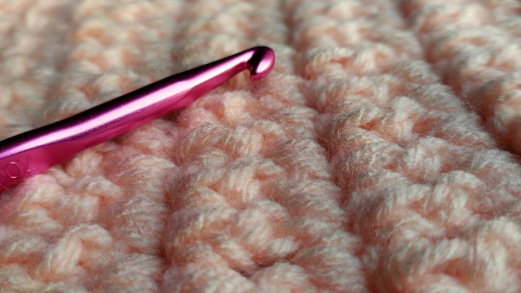 A crochet hook photographed close up
